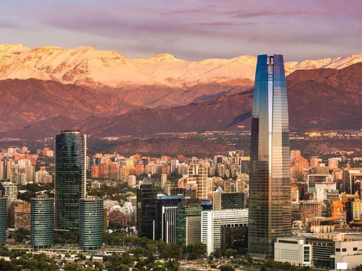 Santiage de Chile during sunset with the snowy mountains in the background