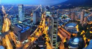 Home Aerial view of the busy streets of Bogota and its buildings by night